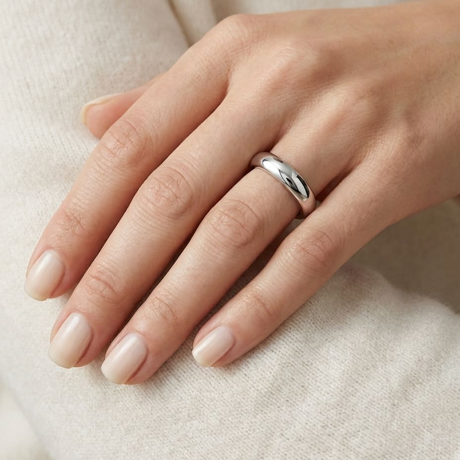 3mm Slightly Domed Super Light Comfort-Fit Wedding Band in Platinum, worn on hand, close-up