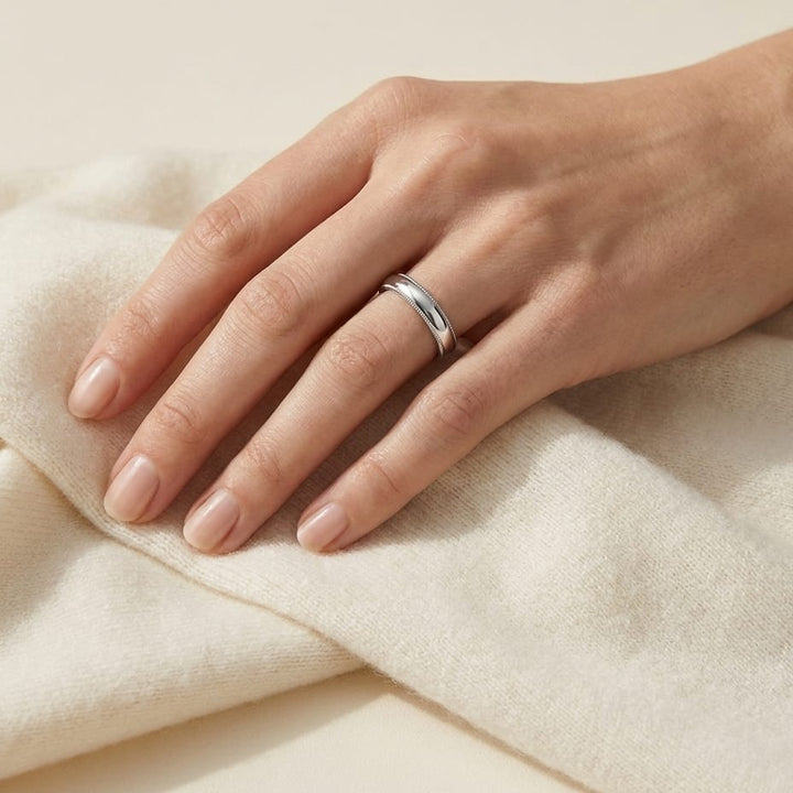 4mm Slightly Domed Super Light Milgrain Comfort-Fit Wedding Band in Platinum, worn on hand, full view