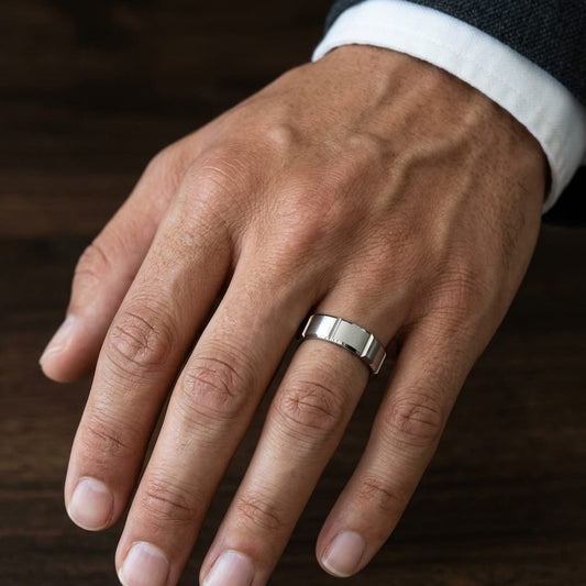 6mm Satin Finish Grooves Carved Wedding Band in Platinum, worn on hand, masculine close-up
