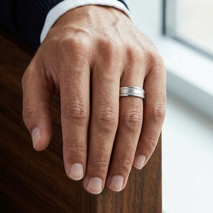 6mm Satin Finish Milgrain Round Edge Carved Wedding Band in Platinum, worn on hand, masculine close-up