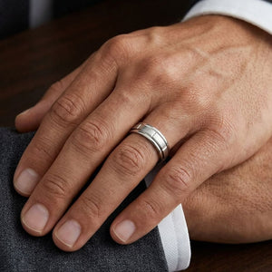 6mm Satin Finish High Polished Center Cut Carved Wedding Band in Platinum, worn on hand, masculine close-up