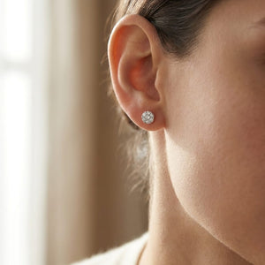 Platinum Bezel Set Round Brilliant Diamond Stud Earrings (1 Ct. T.w., Si1-si2 Clarity, J-k Color), worn close-up portrait