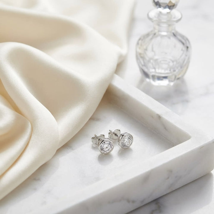 Platinum Bezel Set Round Brilliant Natural Diamond Stud Earrings (1.47 Ct. T.w., SI1-SI2 Clarity, H-i Color) | RockHer