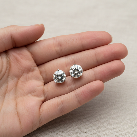 4ct tw Round Brilliant Natural Diamond Stud Earrings, Martini — hand full — Platinum