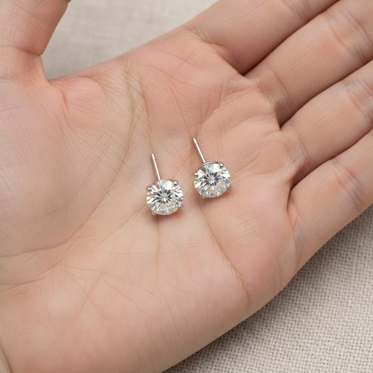 2.5ct tw Round Brilliant Natural Diamond Stud Earrings, 4-Prong — hand full — Platinum