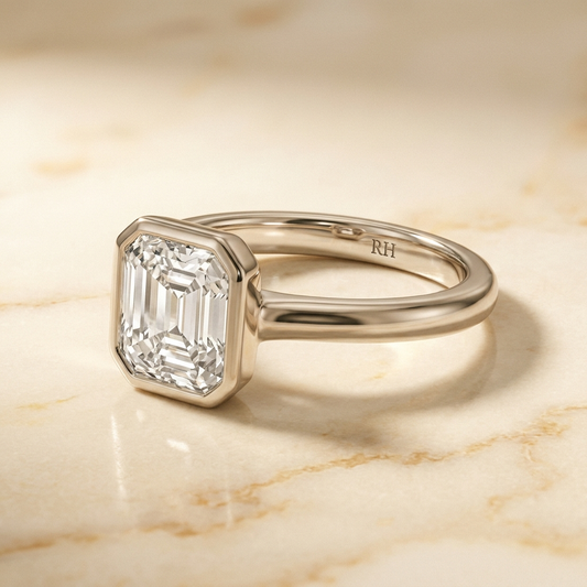 The Agnes bezel solitaire square emerald engagement ring setting in 18k white gold — alt-angle hero — RockHer