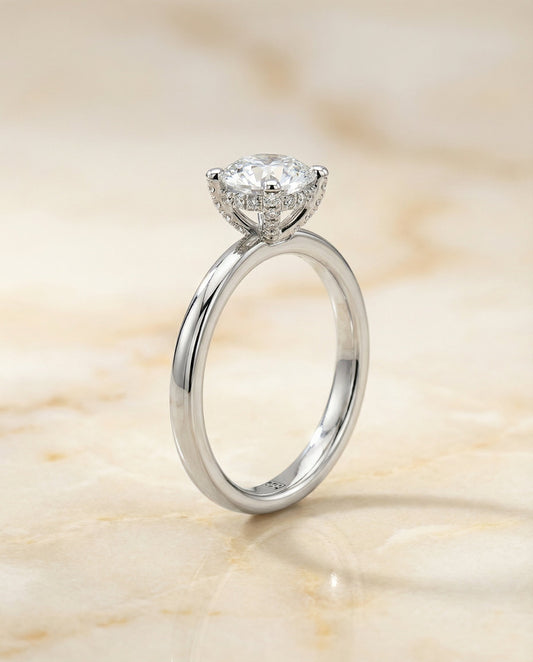 Lana Select secret halo adorned prong solitaire cushion ring in 18K White Gold — front — RockHer