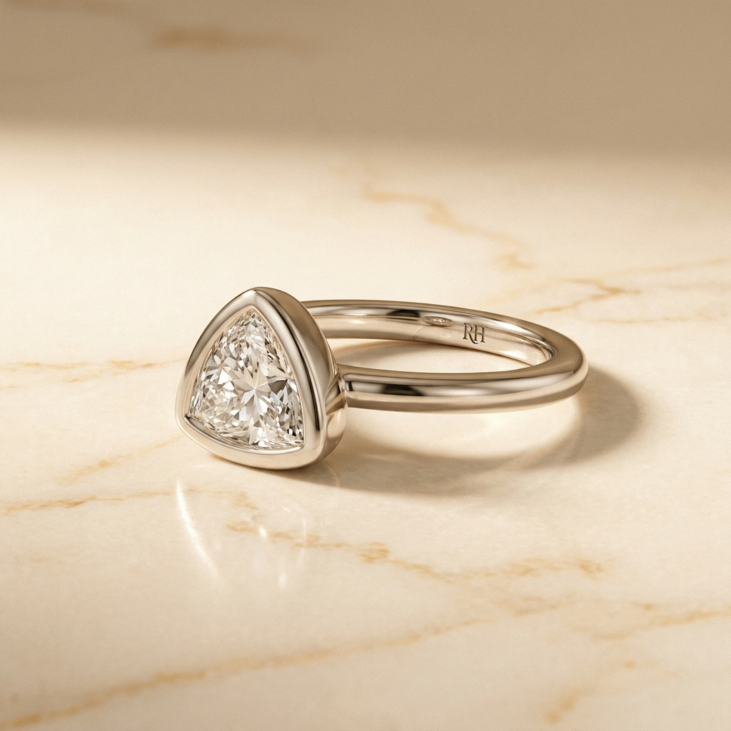The Agnes bezel solitaire trillion engagement ring setting in 18k white gold, alt-angle hero, RockHer