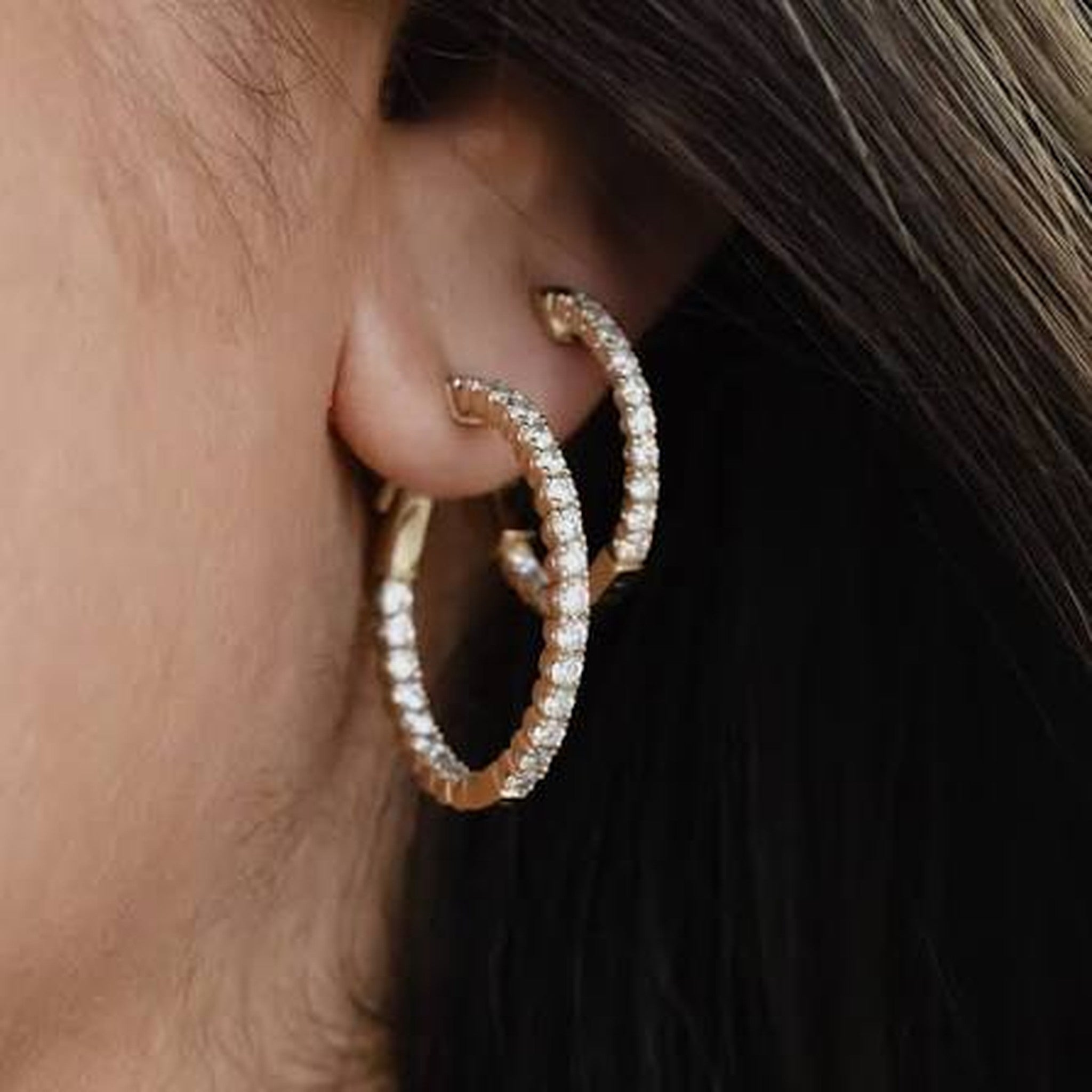 Lab grown diamond inside-out hoop shown on ear in 14kt white gold