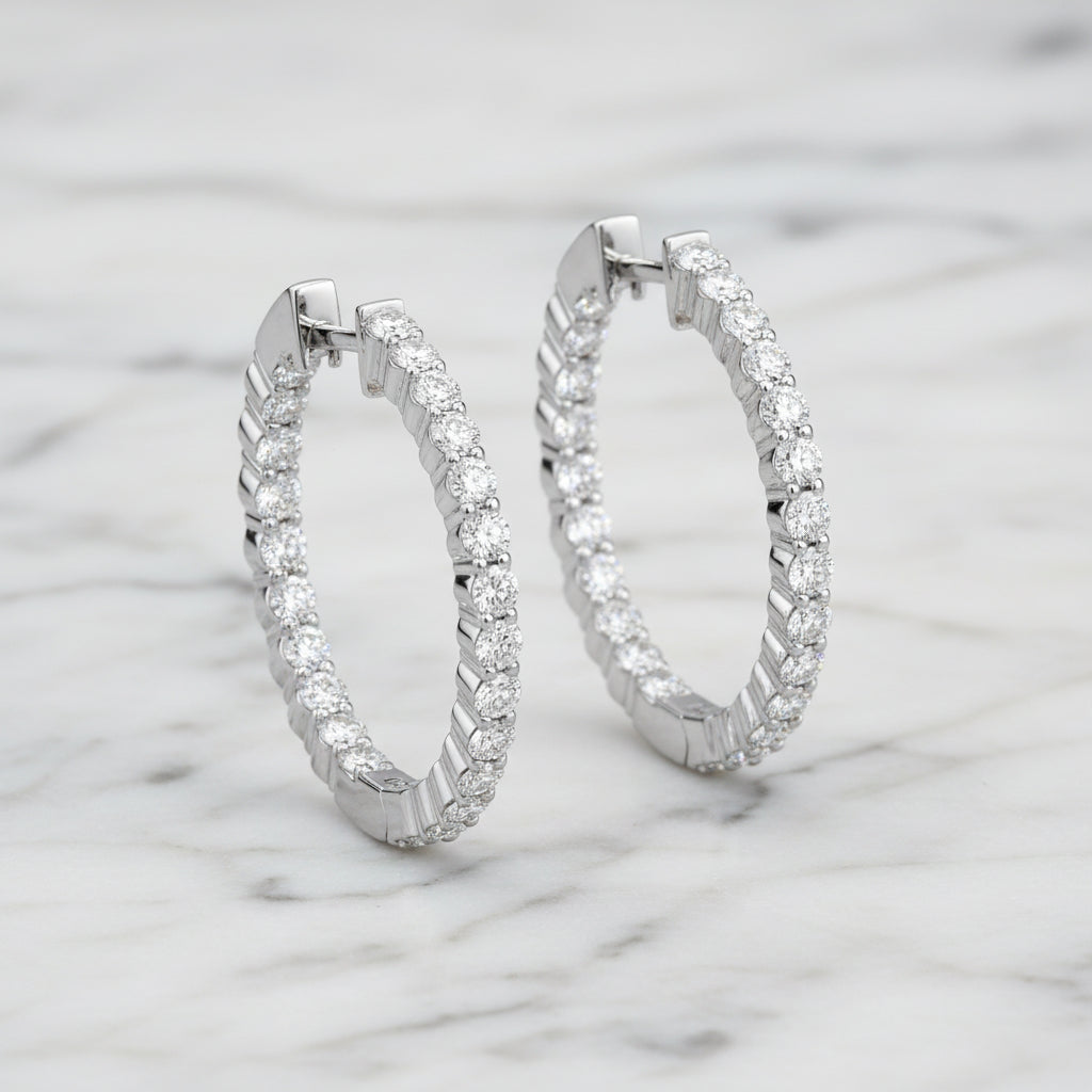 Lab grown diamond inside-out hoops shown on ear in 14kt yellow gold