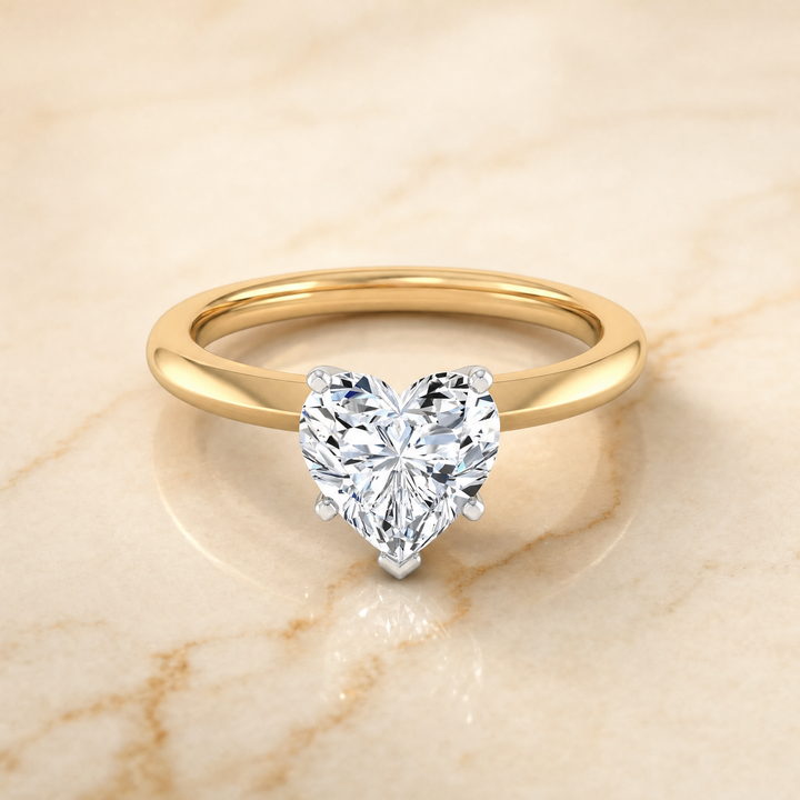 The Isolde Petite Knife Edge Solitaire Heart Engagement Ring Setting in 18K Yellow Gold