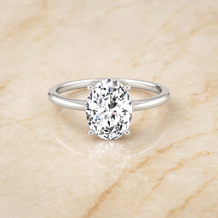 The Cyndi Curved Hidden Halo Solitaire Oval Engagement Ring Setting in Platinum