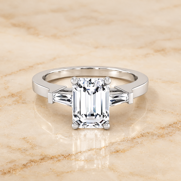 The June Three Stone Emerald Cut Engagement Ring Setting in 18K White Gold