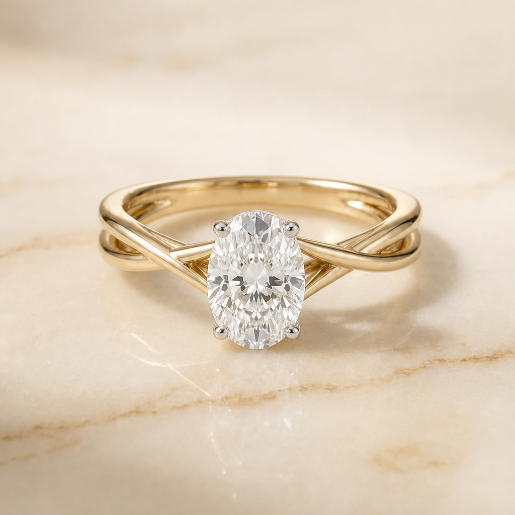 The Grace Twisted Shank Hidden Halo Solitaire Oval Engagement Ring Setting in 18K Yellow Gold
