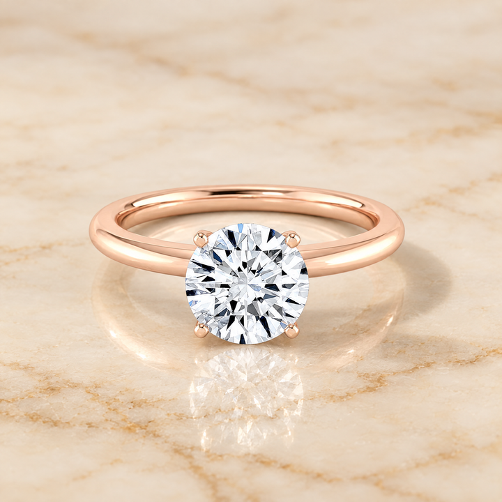 The Floria Comfort Fit Claw Prong Solitaire Round Engagement Ring Setting in 14K Rose Gold