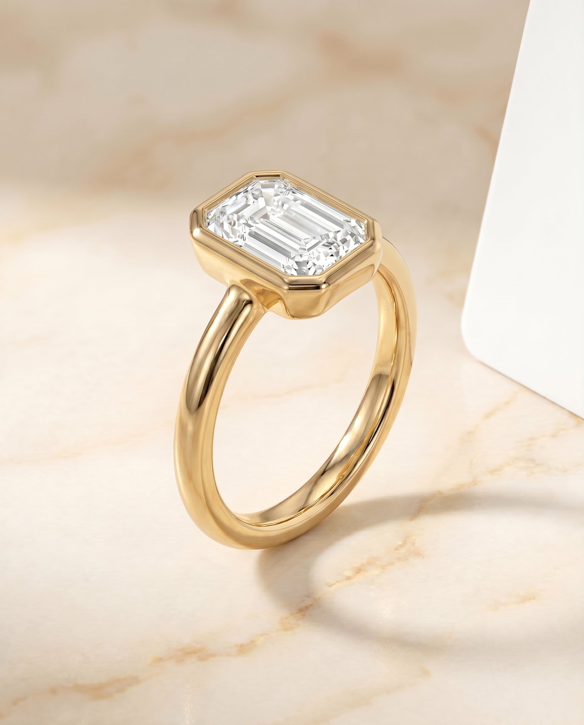 The Agnes setting for emerald diamonds, made to order in 18K Yellow Gold | RockHer