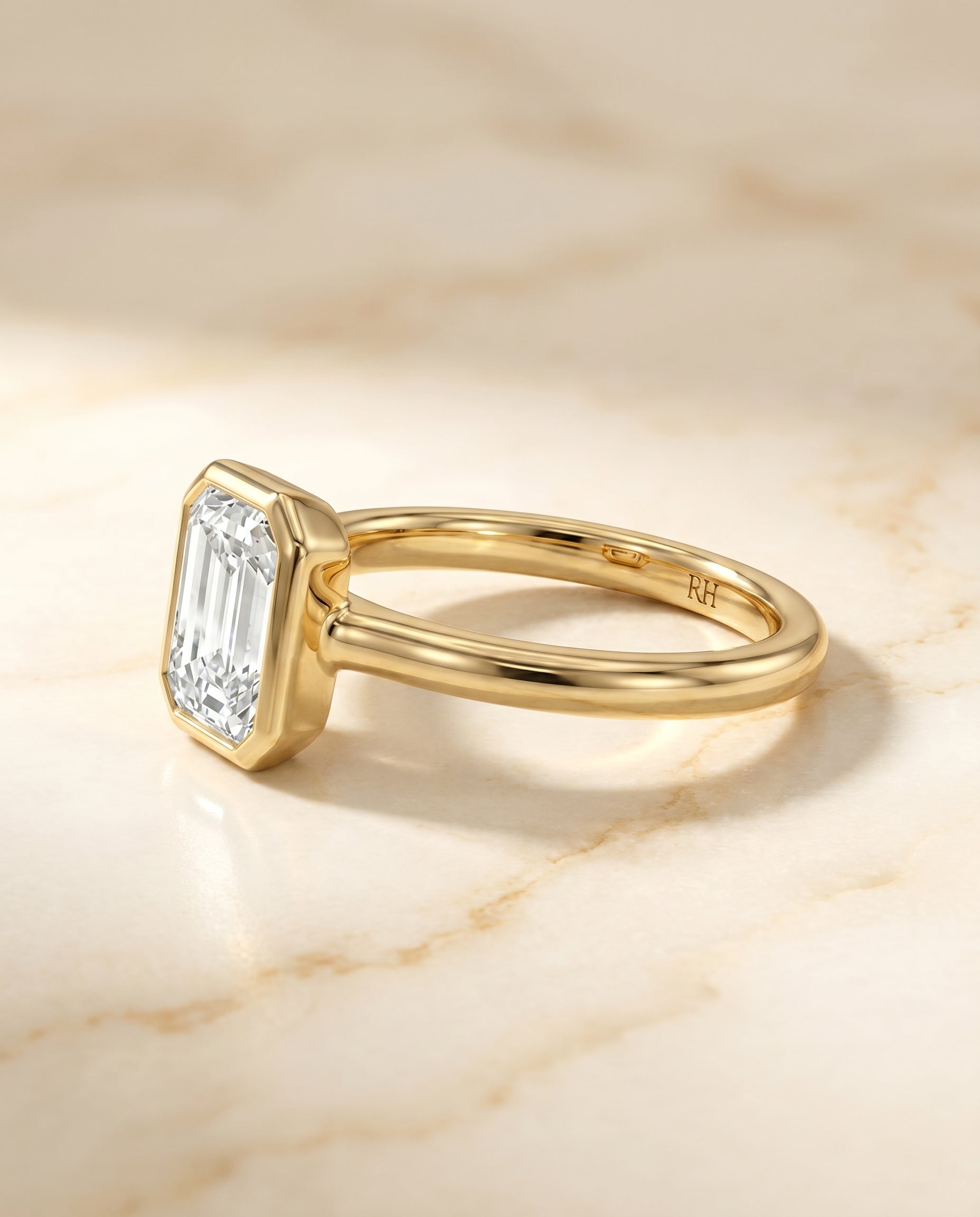 Bezel Solitaire In Cut styling on The Agnes emerald engagement ring setting | RockHer