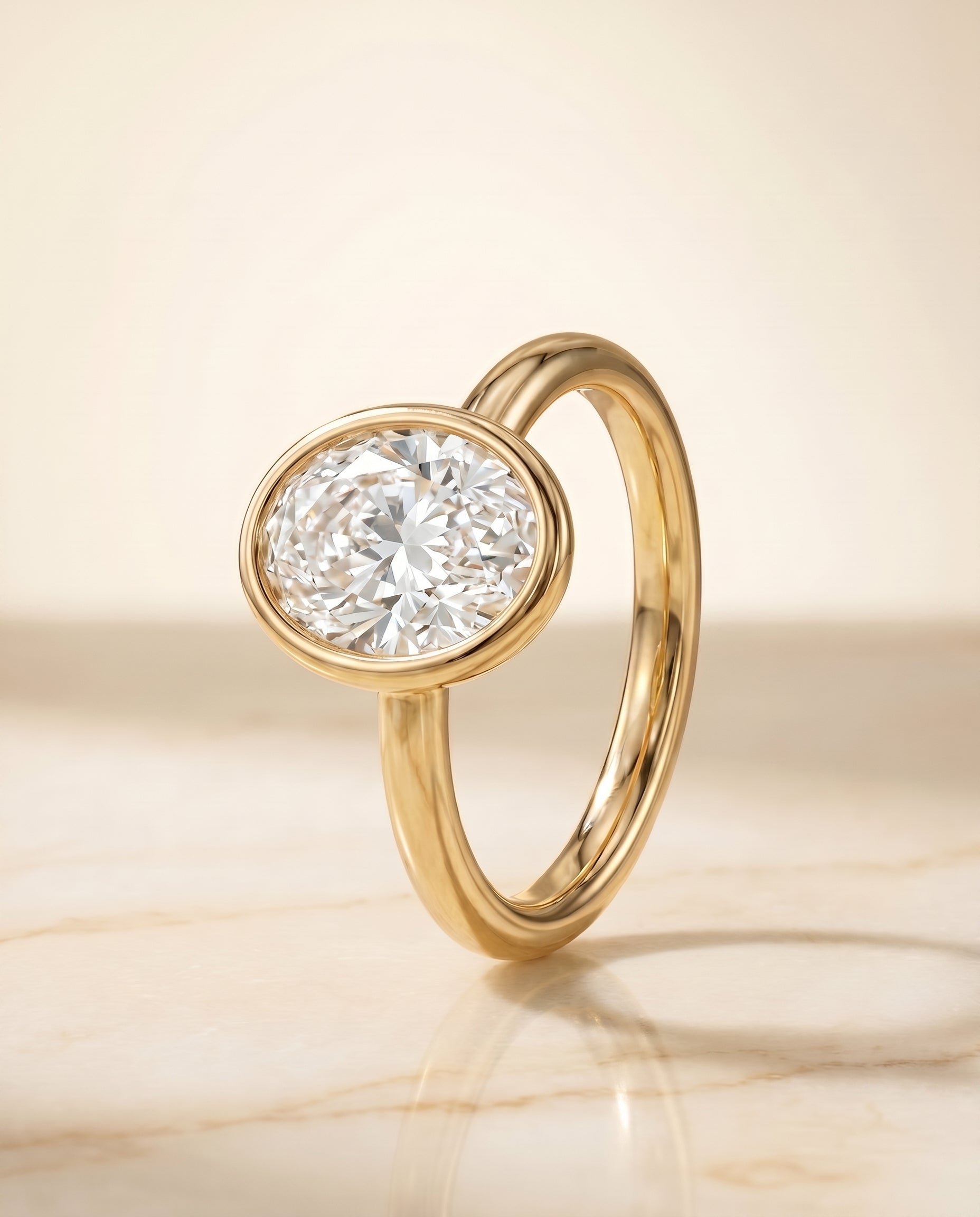 Bezel Solitaire In styling on The Agnes oval engagement ring setting | RockHer