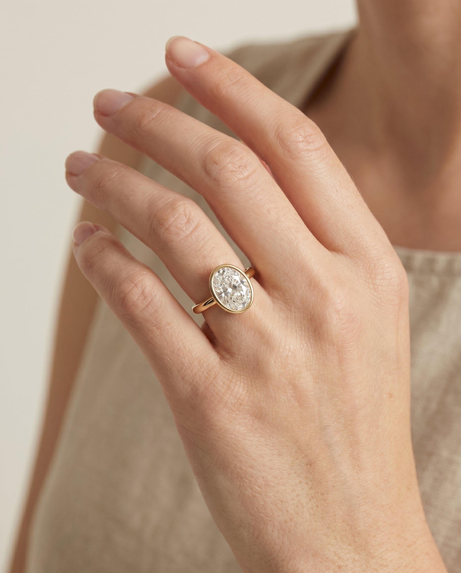 The Agnes engagement ring setting in 18K Yellow Gold, bezel solitaire in design | RockHer