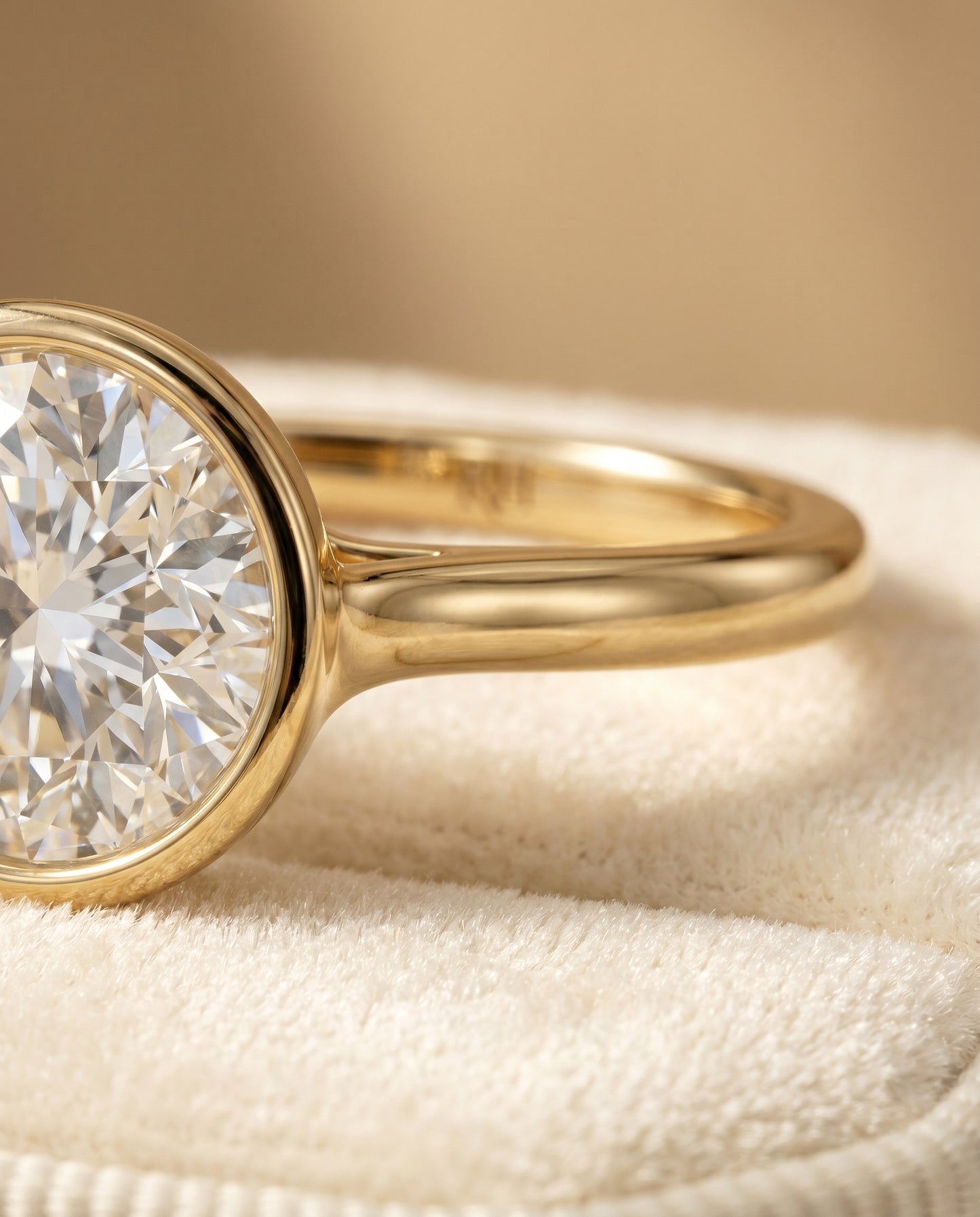Agnes Round Brilliant Bezel Solitaire in 18K Yellow Gold