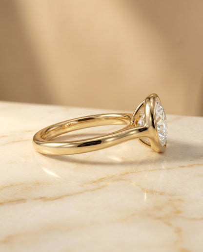 Agnes Select Bezel Solitaire In Round Lab Diamond Engagement Ring in 18K Yellow Gold, side view | RockHer
