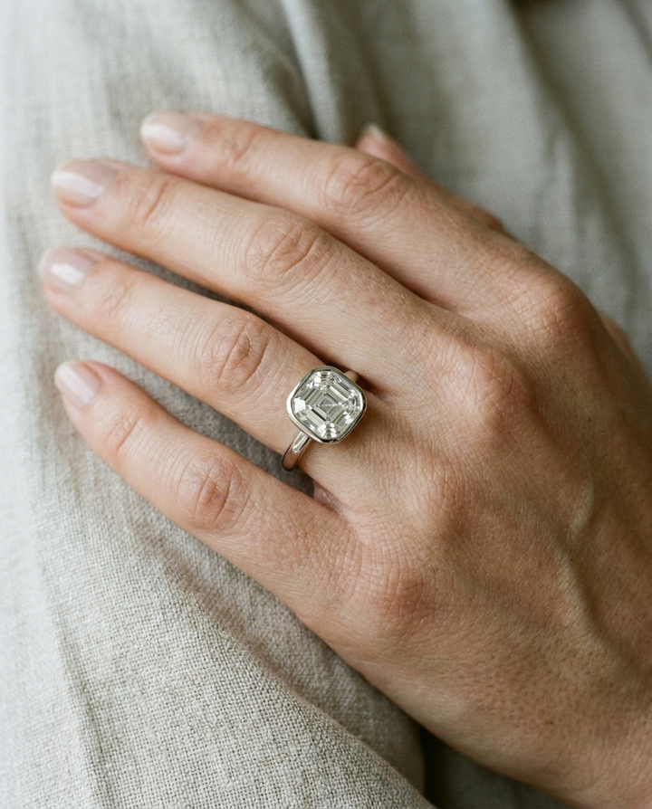 The Agnes Select bezel solitaire asscher engagement ring in 18k white gold — on hand — RockHer