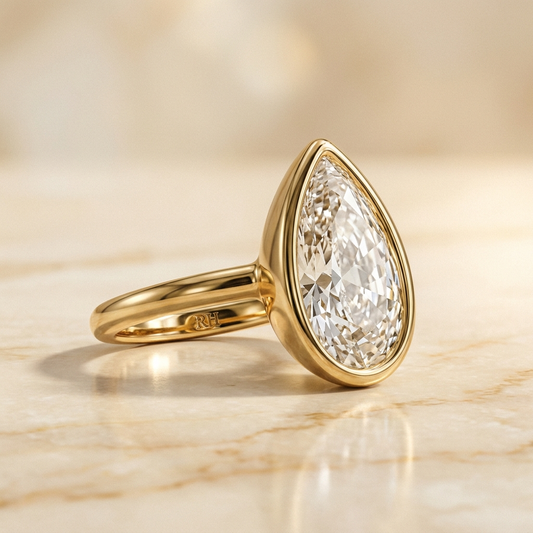 Agnes Briolette bezel solitaire engagement ring setting in 18K Yellow Gold — alt-angle hero — RockHer