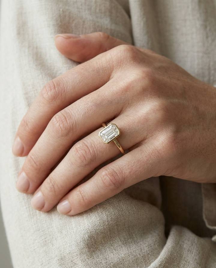 The Agnes Select bezel solitaire briolette engagement ring in 18k white gold — on hand — RockHer