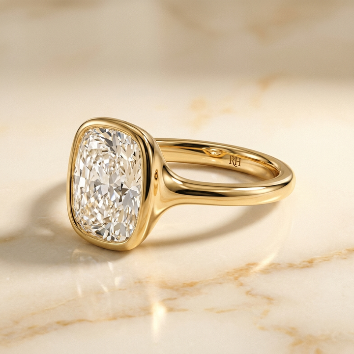 Agnes Select Bezel Solitaire In Cushion Cut Lab Diamond Engagement Ring in 18K Yellow Gold, studio view | RockHer