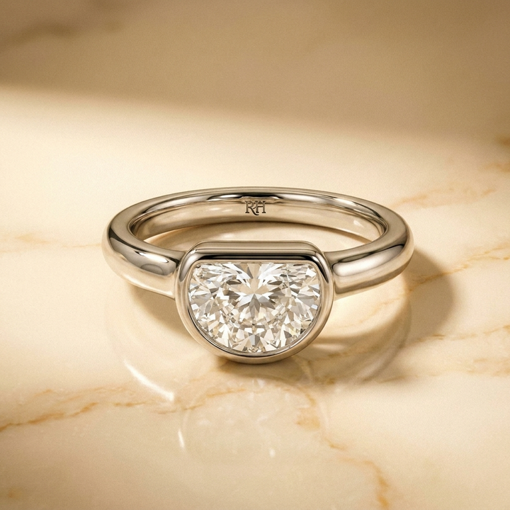The Agnes Select bezel solitaire half cut engagement ring in platinum — front view — RockHer