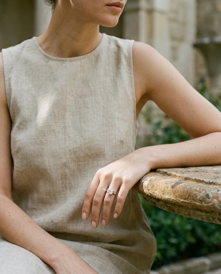 The Agnes Select bezel solitaire half cut engagement ring in platinum — lifestyle — RockHer