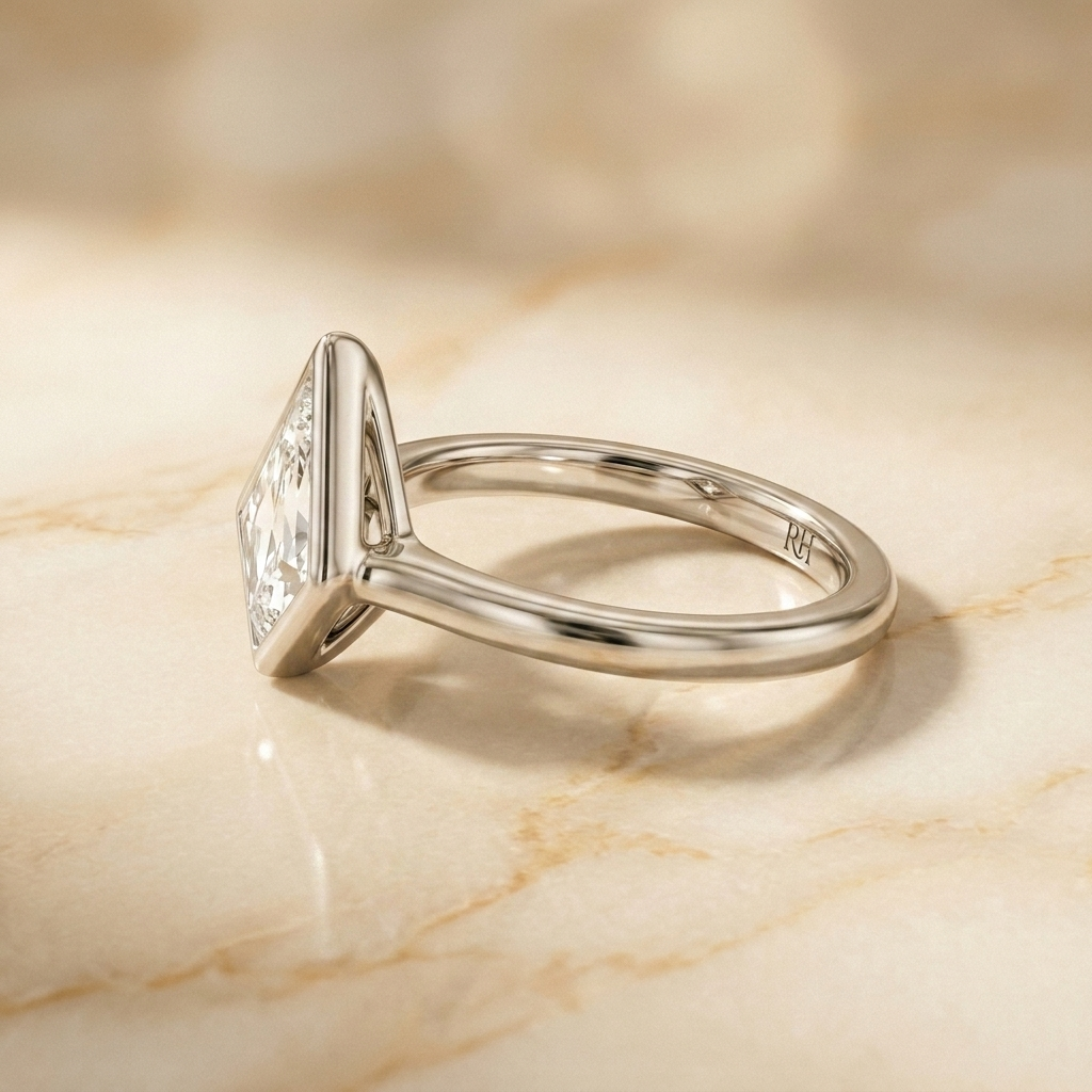 The Agnes Select bezel solitaire kite engagement ring in platinum — side profile — RockHer