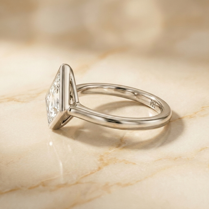 The Agnes Select bezel solitaire kite engagement ring in platinum — side profile — RockHer