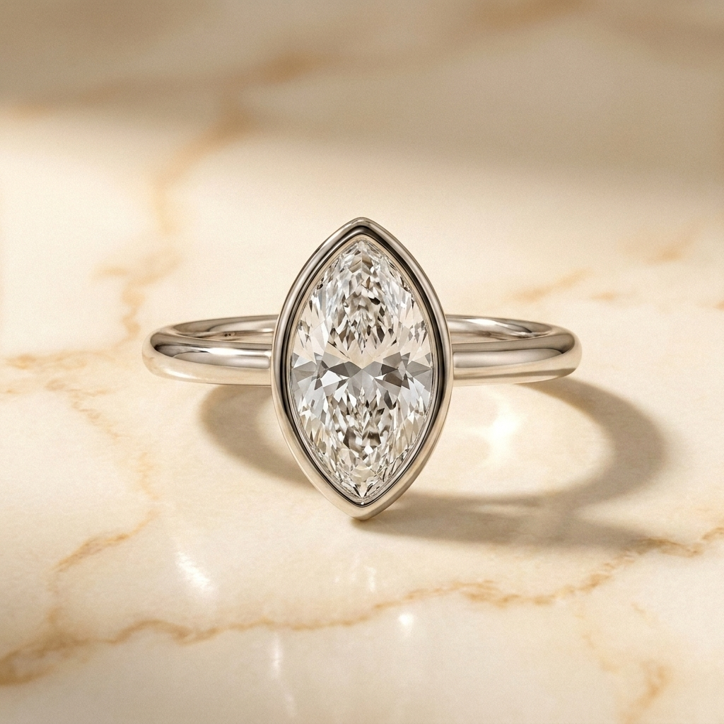 The Agnes Select bezel solitaire marquise engagement ring in platinum — front view — RockHer