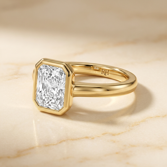 Agnes Radiant bezel solitaire engagement ring setting in 18K Yellow Gold — alt-angle hero — RockHer