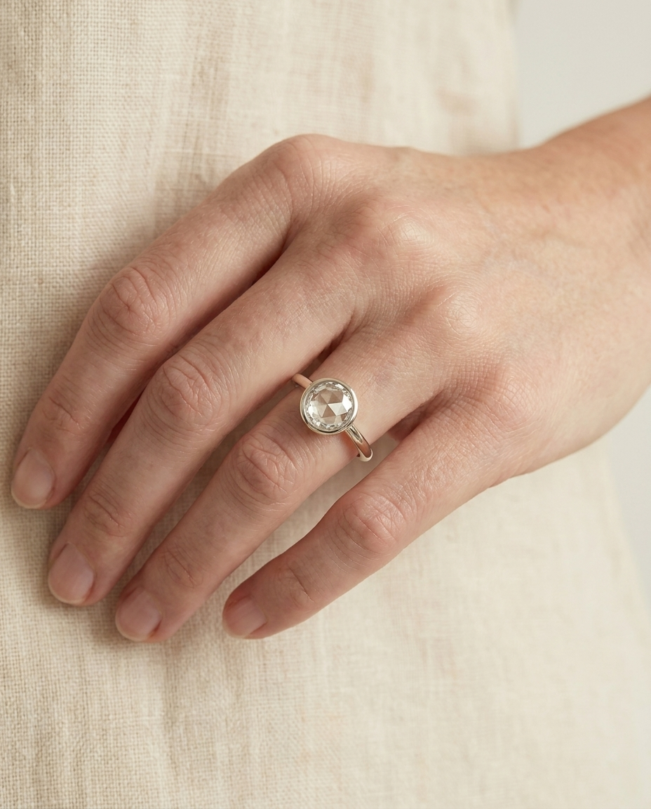 The Agnes Select bezel solitaire rose cut engagement ring in platinum — on hand — RockHer