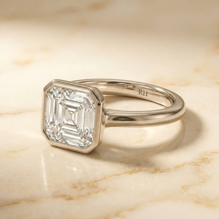 The Agnes Select bezel solitaire square emerald engagement ring in platinum — side profile — RockHer