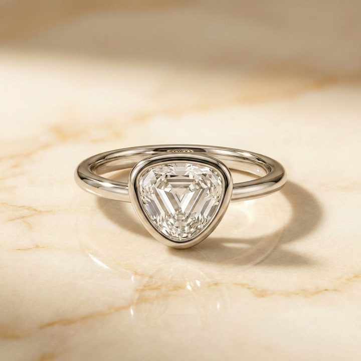 The Agnes Select bezel solitaire shield engagement ring in 18k white gold — front view — RockHer