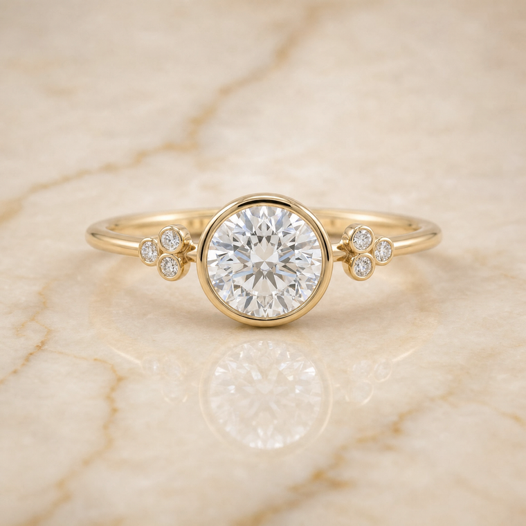 The Selena Clover Bezel Accent Solitaire Round Engagement Ring Setting in 18K Yellow Gold