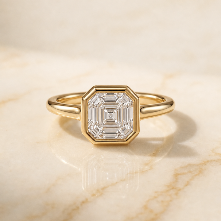 The Agnes Bezel Solitaire In Asscher Cut Engagement Ring Setting in 18K Yellow Gold