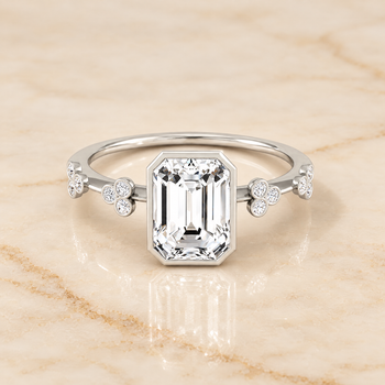 The Miley Clover Bezel Accent Solitaire Emerald Cut Engagement Ring Setting in Platinum