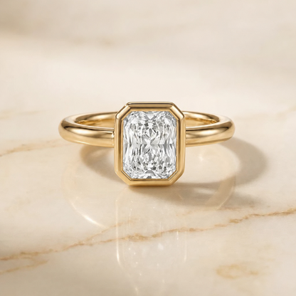 The Agnes Bezel Solitaire In Radiant Cut Engagement Ring Setting in 18K Yellow Gold