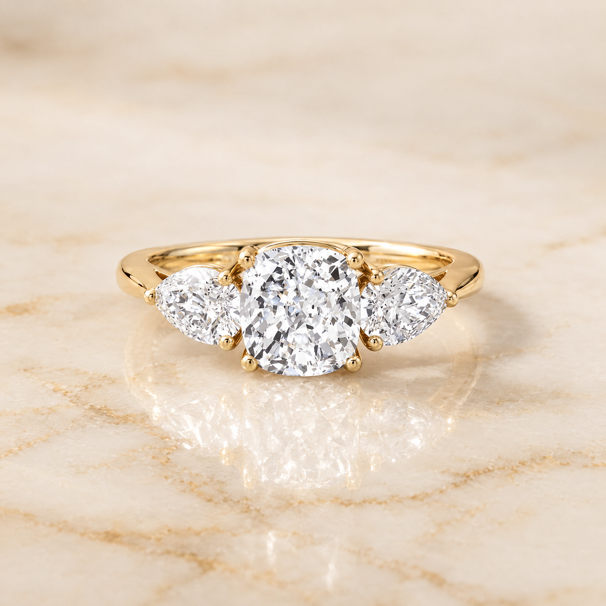 The Angelica Three Stone Matched Cushion Cut Engagement Ring Setting in 18K Yellow Gold