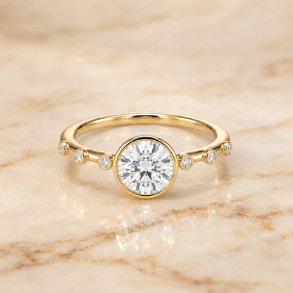 The Brandi Bezel Accent Solitaire Round Engagement Ring Setting in 18K Yellow Gold