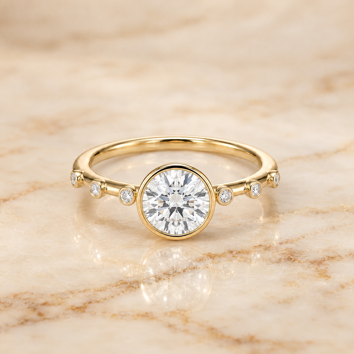The Brandi Bezel Accent Solitaire Round Engagement Ring Setting in 18K Yellow Gold