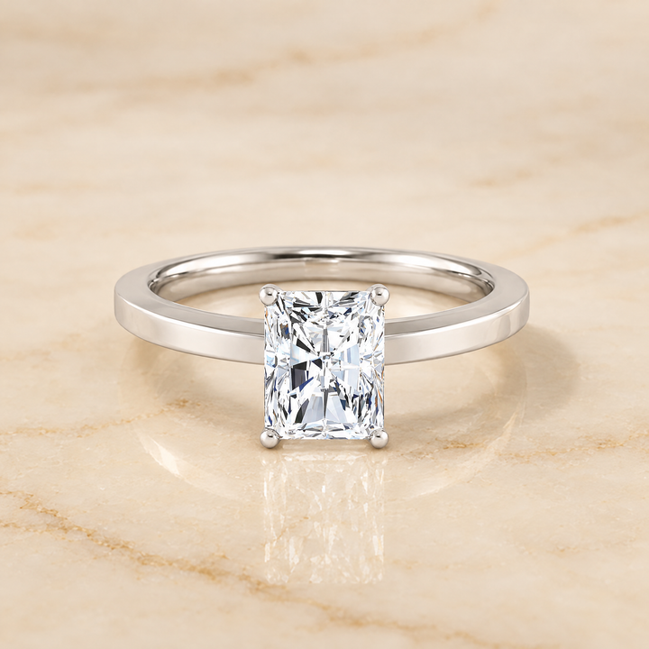 The Carmen Beveled Edge Comfort Fit Solitaire Radiant Cut Engagement Ring Setting in Platinum