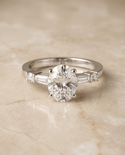 Baguette and Round Side Stone Oval, in Platinum – side profile | RockHer