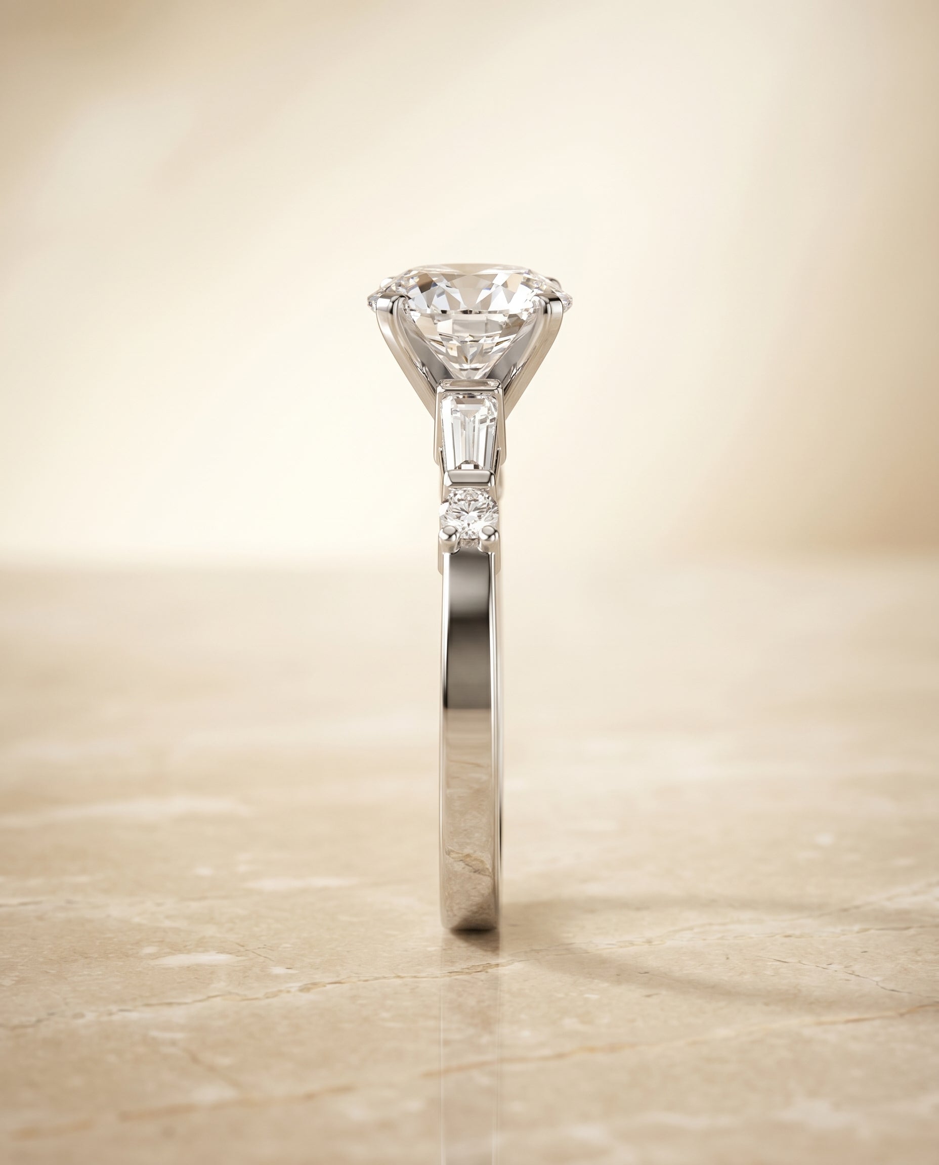 The Diana tapered baguette three stone engagement ring setting, shown in Platinum | RockHer