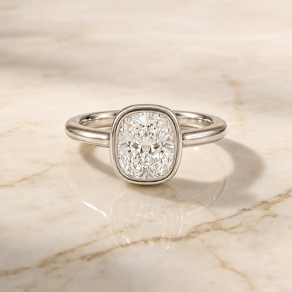 The Agnes Bezel Solitaire In Cushion Cut Engagement Ring Setting in 18K White Gold