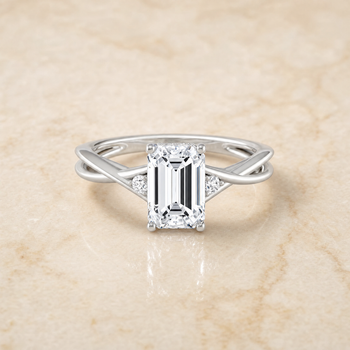The Dusty Hidden Halo Solitaire Emerald Cut Engagement Ring Setting in 18K White Gold